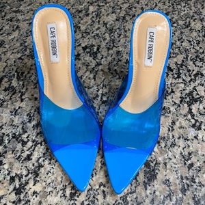 Clear blue pointy mules